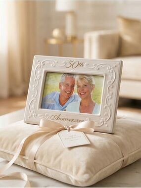 Malden White 50th Anniversary frame. Very tiny chip in lower left corner.